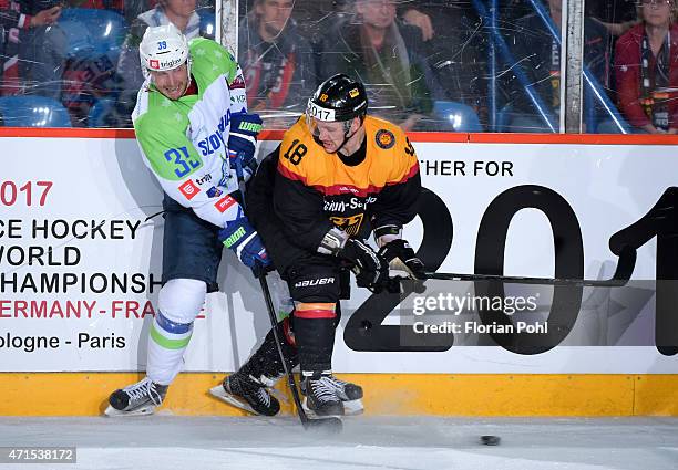 Jan Mursak of Team Slovenia and Kai Hospelt of Team Germany during the game between Germany and Slovenia on april 29, 2015 in Berlin, Germany.