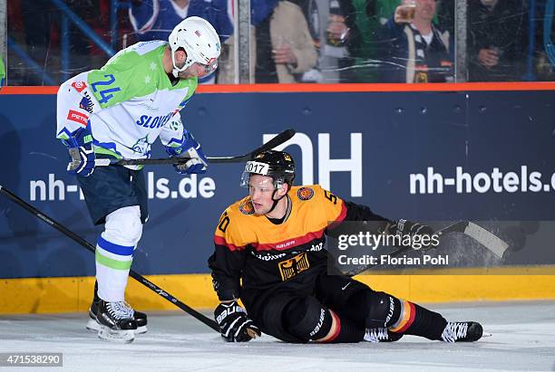 Rok Ticar of Team Slovenia and Patrick Hager of Team Germany during the game between Germany and Slovenia on april 29, 2015 in Berlin, Germany.