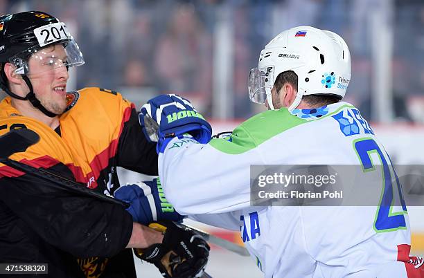 Patrick Hager of Team Germany and Rok Ticar of Team Slovenia during the game between Germany and Slovenia on april 29, 2015 in Berlin, Germany.