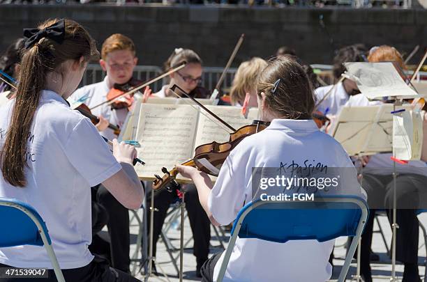 passion fof music - orchestra outside stock pictures, royalty-free photos & images