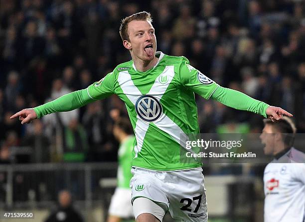 Maximilian Arnold of Wolfsburg celebrates after scoring his team's fourth goal during the DFB Cup Semi Final match between Arminia Bielefeld and VfL...
