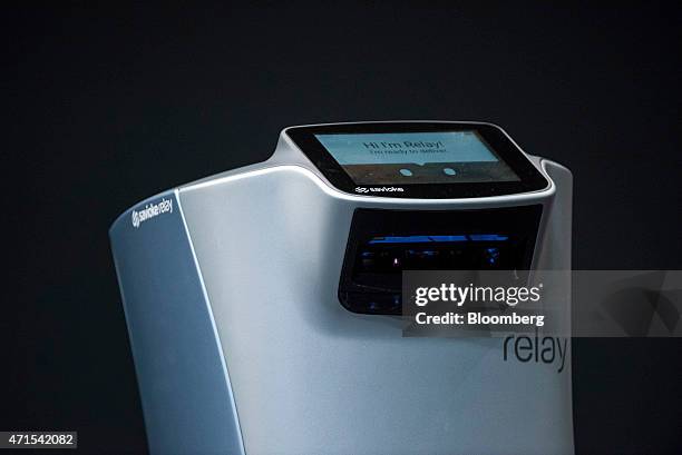 Relay, a robot manufactured by Savioke Inc., is displayed at the Bloomberg Businessweek Design 2015 Conference in San Francisco, California, U.S., on...