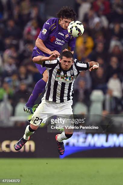 Stefano Sturaro of Juventus FC clashes with Stefan Savic of ACF Fiorentina during the Serie A match between Juventus FC and ACF Fiorentina at...