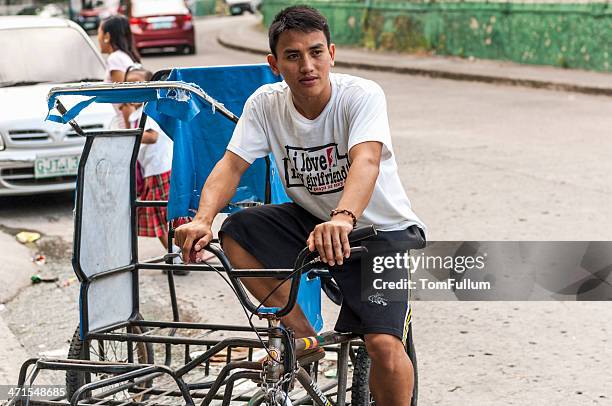 tricycle driver - filipino tricycle stock pictures, royalty-free photos & images
