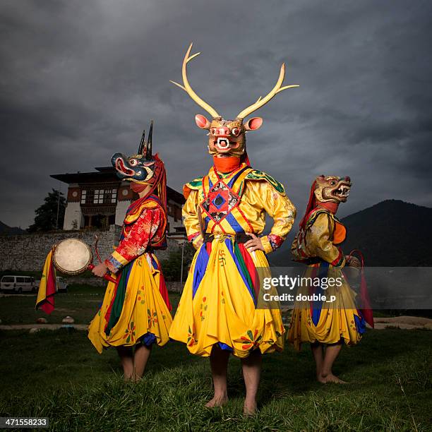 bhutan dancers - bhutan monks stock pictures, royalty-free photos & images