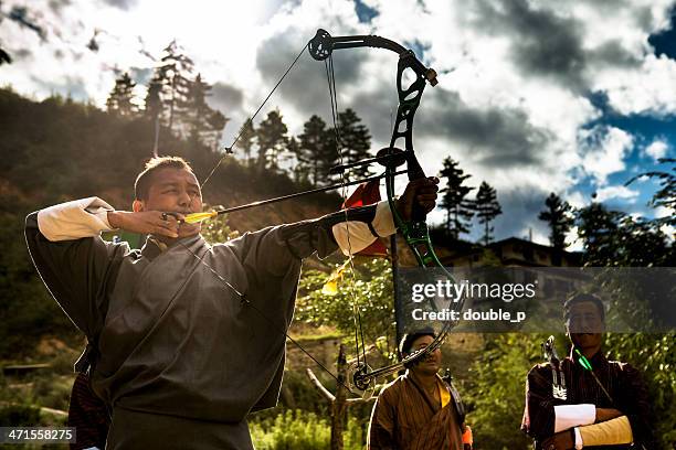 archer - bhutan archery stock pictures, royalty-free photos & images