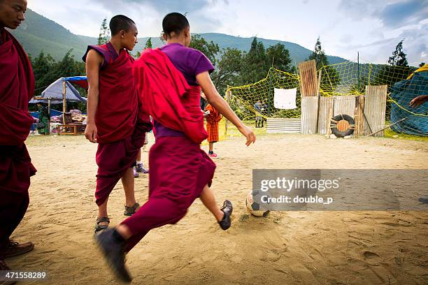 football - bhutan monks stock pictures, royalty-free photos & images