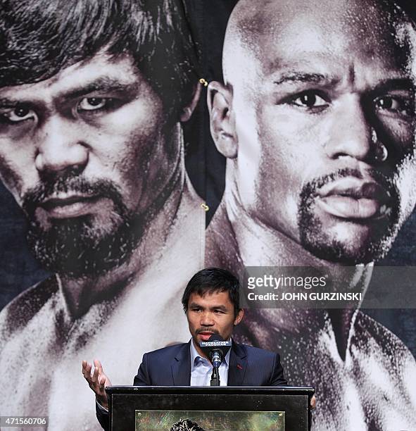 Welterweight champion Manny Pacquiao speaks during a news conference at the KA Theatre at MGM Grand Hotel & Casino on April 29, 2015 in Las Vegas,...