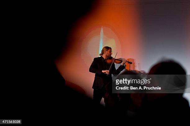David Garrett performs at the IPO Summer Gala hosted by the British Friends of the Israel Philharmonic Orchestra at Sotheby's on April 29, 2015 in...