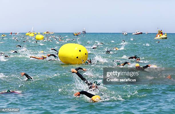 ironman 70.3 italy, swim split - amateur sport stock pictures, royalty-free photos & images