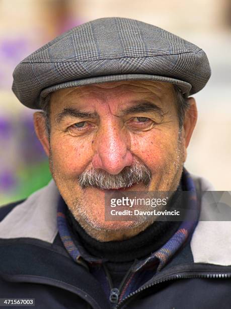 senior with cap - georgian man stock pictures, royalty-free photos & images