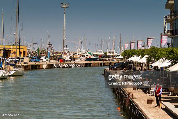 channel at port of gabicce mare (italy) - cattolica beach stock pictures, royalty-free photos & images