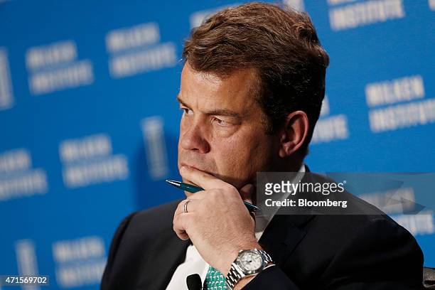 Brooks Entwistle, partner and chief executive officer of Everstone Capital Advisors, listens during the annual Milken Institute Global Conference in...