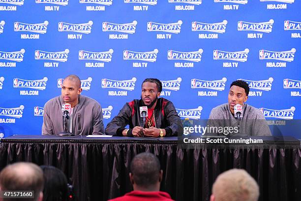 Al Horford, DeMarre Carroll and Jeff Teague of the Atlanta Hawks are interviewed at the post game press conference after Game Five of the Eastern...