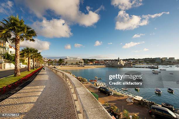 avenida dom carlos i in the center of cascais - cascais stock pictures, royalty-free photos & images