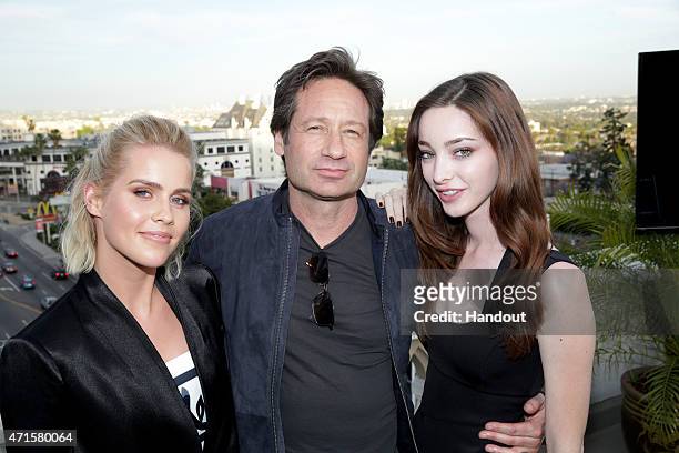 In this handout image provided by NBCUniversal, Claire Holt, David Duchovny, and Emma Dumont gather in celebration of the May 28 premiere of NBC's...
