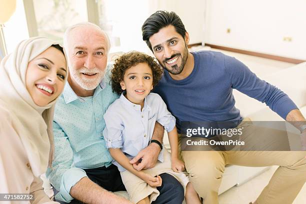 three genration arabic family taking a selfie - arab family stock pictures, royalty-free photos & images