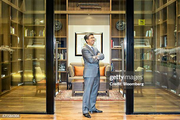 Tengku Zafrul Aziz, chief executive officer of CIMB Group Holdings Bhd., poses for a portrait before an interview in Kuala Lumpur, Malaysia, on...