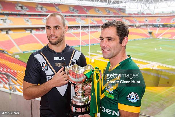 New Zealand captain Simon Mannering and Australian captain Cameron Smith pose with trophy ahead of the International Test match during a press...
