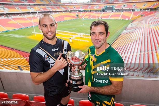 New Zealand captain Simon Mannering and Australian captain Cameron Smith pose with trophy ahead of the International Test match during a press...