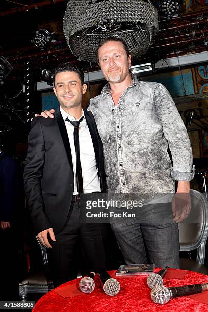 Singer Gregory Bakian and football Champion Emmanuel Petit attend the Gregory Bakian's '1er EP Eponyme' Concert Launch Party at Le Reservoir on April...