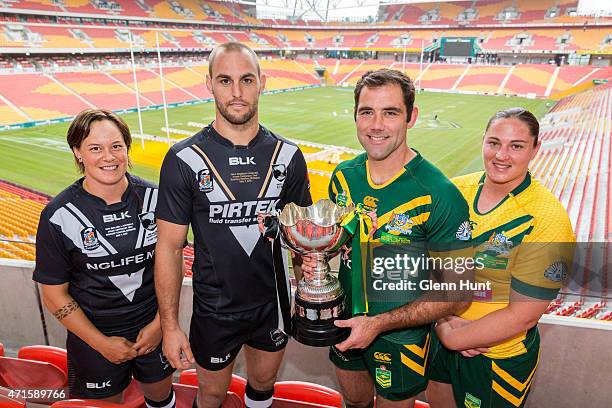 New Zealand women's captain Laura Mariu, men's captain Simon Mannering, Australian men's captain Cameron Smith and women's captain Laura Mariu pose...