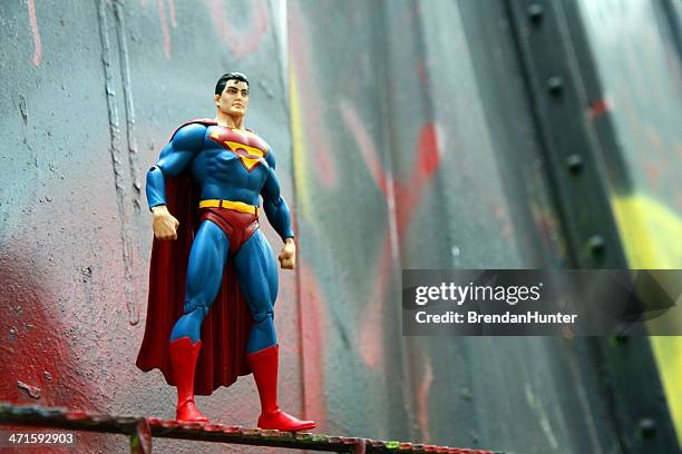 superman and bent metal - superman named work stock pictures, royalty-free photos & images