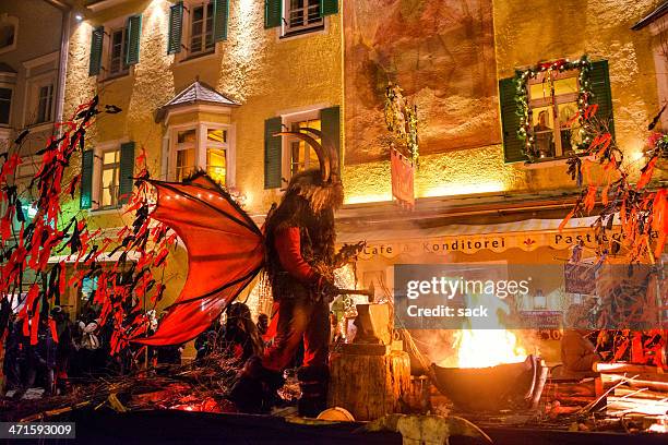 sterzing on fire during tuifltog (krampus night) - st nicholas stock pictures, royalty-free photos & images