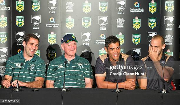 Australia captain Cameron Smith and coach Tim Sheens sit alongside New Zealand coach Stephen Kearney and captain Simon Mannering at a press...