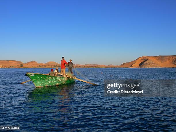 nubian fisher on lake nasser - freshwater fish stock pictures, royalty-free photos & images