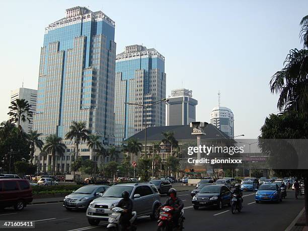 indonesia bank towers, jakarta - indonesia - indonesia bikes traffic stock pictures, royalty-free photos & images