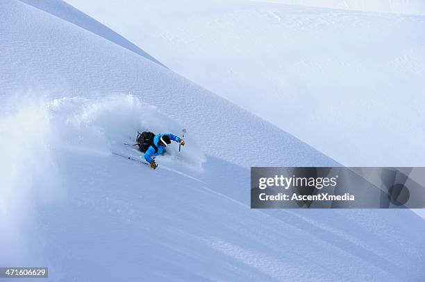 powder turn - back country skiing stock pictures, royalty-free photos & images