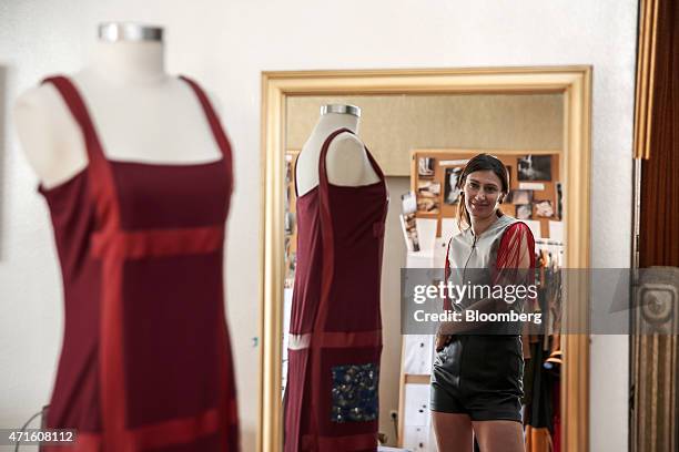 Eleni Kyriacou, a fashion designer, poses for a photograph in her studio, in Athens, Greece, on Saturday, April 25, 2015. The downturn that decimated...