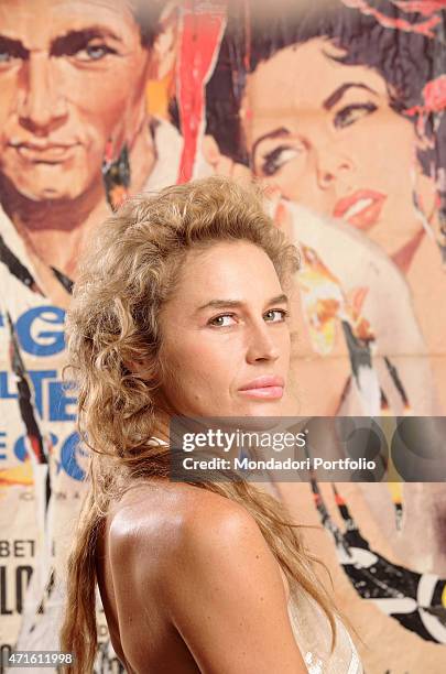 "The showgirl Lory Del Santo in a photo shooting. Milan, Italy. In the background, a dcollage artwork. 20th November 2005 "