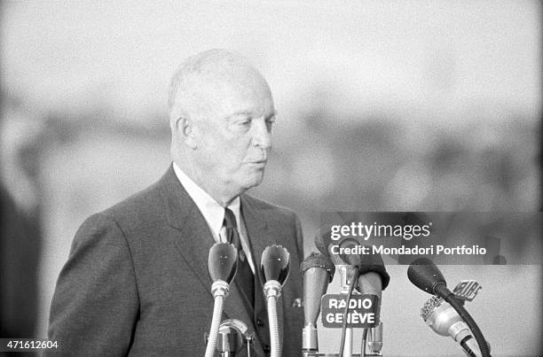 "The President of United States Dwight Eisenhower speaking into Radio Genve microphones during the Geneva Summit discussing issues about security,...