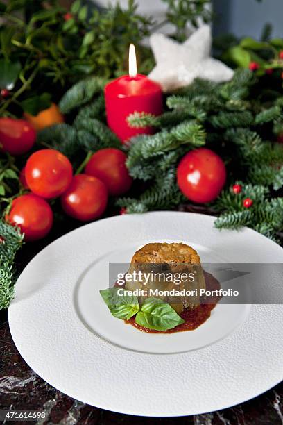 "The candele timbale with Neapolitain sauce presented by the chef Gennaro Esposito. Photo shooting. Vico Equense , December 2013 "