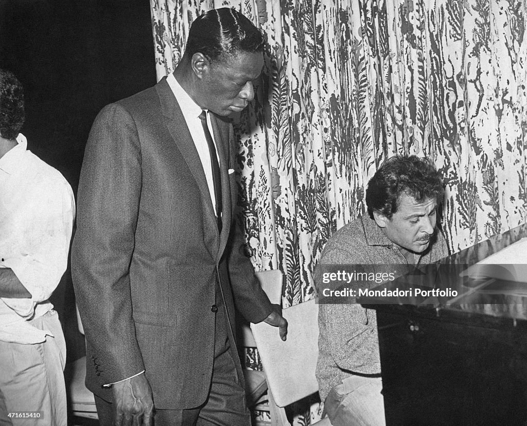 Domenico Modugno playing beside Nat King Cole