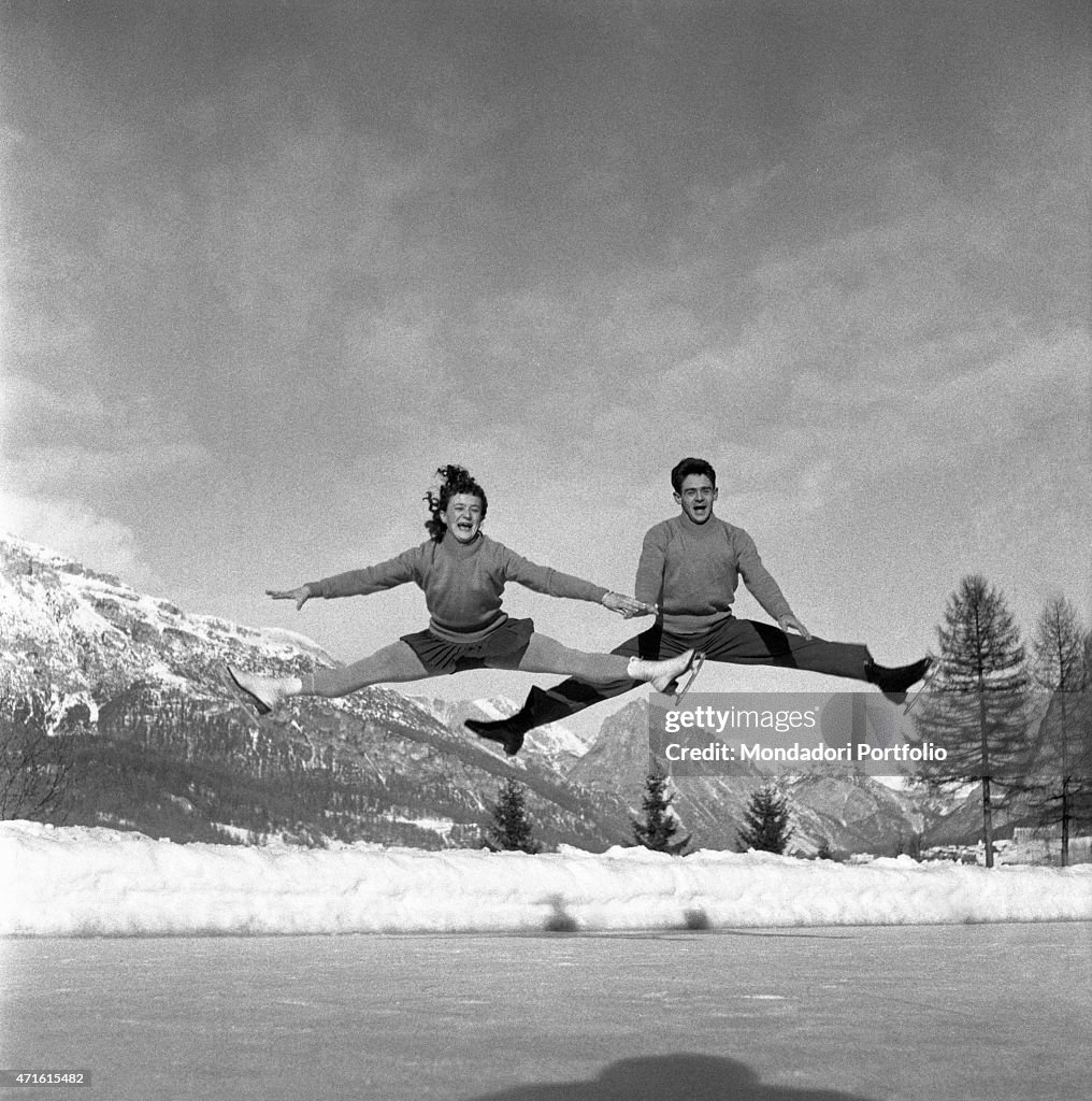 Figure skaters performing at 1956 Winter Olympics