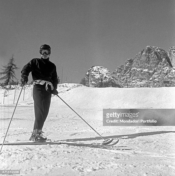 "Japanese alpine ski racer Chiharu Igaya, competing in the VII Olympic Winter Games, training on the ski slope. Cortina d'Ampezzo, 1956 "
