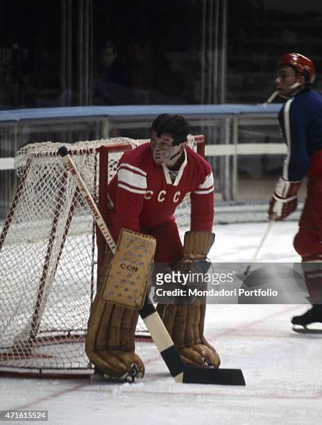 "The goalkeeper of the Soviet ice hockey team waiting in front of the goal post during the VII Olympic Winter Games. Cortina d'Ampezzo, 1956 "