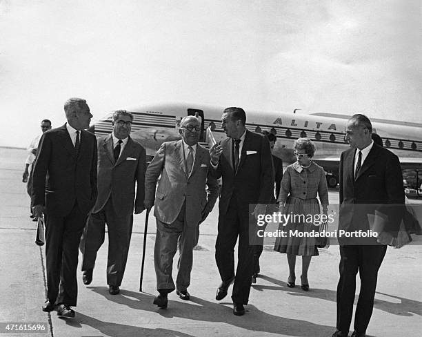 "American cartoonist, animator and tycoon Walt Disney and his wife Lillian Bounds being welcomed at the airport by Italian publisher Arnoldo...