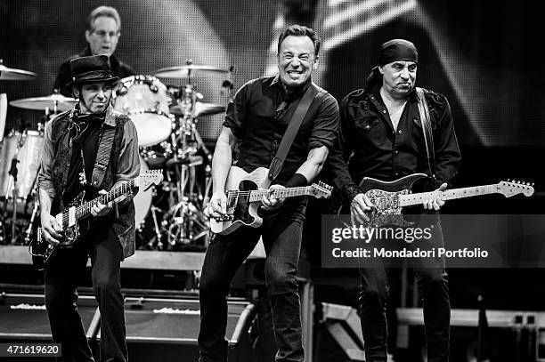 "The American guitarist and singer-songwriter Bruce Springsteen during the concert at San Siro Stadium. To his right the musician Nils Lofgren and,...