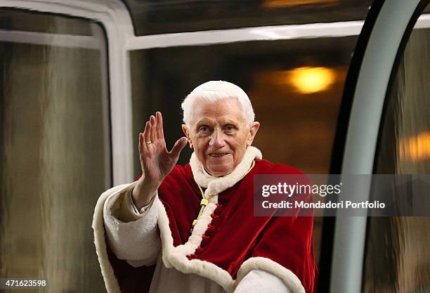 "Pope Benedict XVI crossing the Square on the popemobile to greet the believers gathered for the Taiz European Meeting. Vatican City, 2012 "