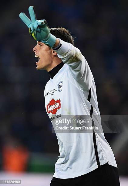 Alexander Schwolow of Bielefeld reacts during the DFB Cup semi final match between Arminia Bielefeld and VfL Wolfsburg at Schueco Arena on April 29,...