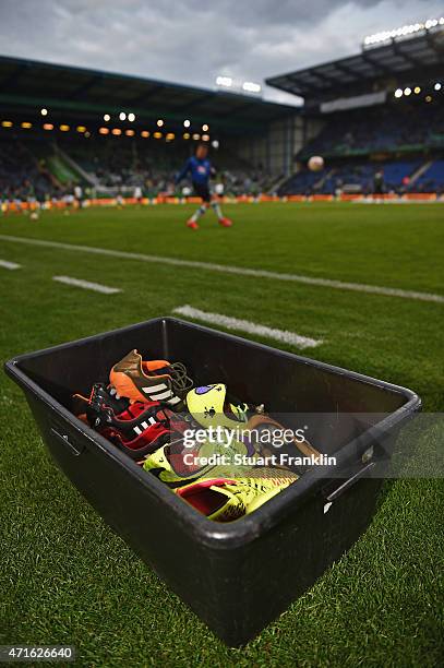 Box of spare football boots is seen pitchside during warm up prior to the DFB Cup semi final match between Arminia Bielefeld and VfL Wolfsburg at...