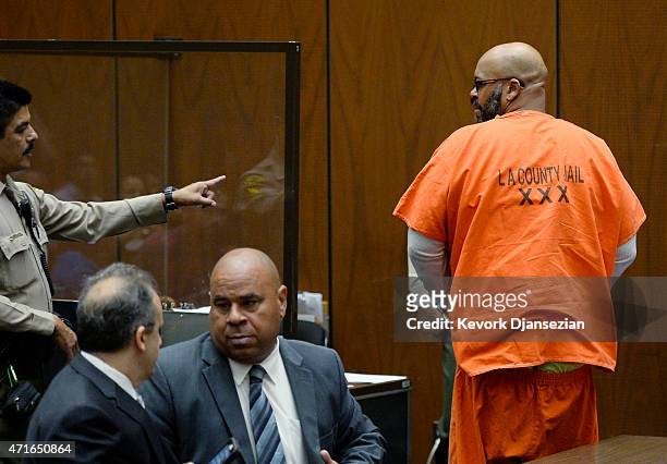 Marion 'Suge' Knight , who is charged with murder, attempted murder and hit-and-run for allegedly running down two men in Compton killing one of...