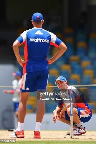 Jonathan Trott looks towards Stuart Broad whilst inspecting the wicket during the England nets session at Kensington Oval ahead of the 3rd Test match...