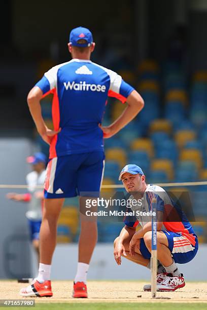 Jonathan Trott looks towards Stuart Broad whilst inspecting the wicket during the England nets session at Kensington Oval ahead of the 3rd Test match...