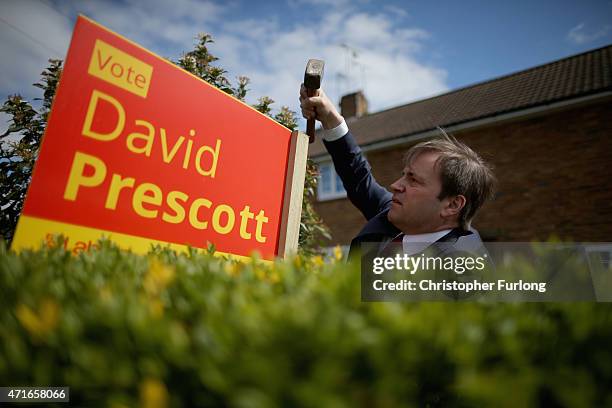 Labour candidate for Gainsborough David Prescott erects a placard in the garden of a supporter as he canvasses for votes in the 2015 election on...