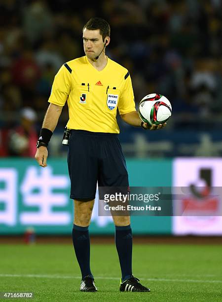 Referee Jarred Gillet holds the ball during the J.League match between Yokohama F.Marinos and Sanfrecce Hiroshima at Nissan Stadium on April 29, 2015...